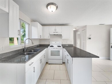 609 S 67th St, Tampa, FL 33619 - photo 6