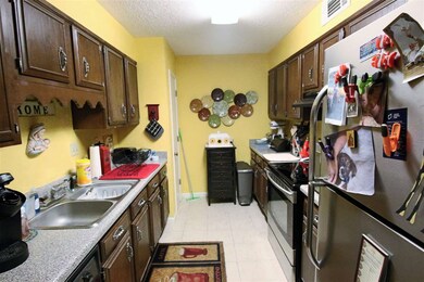 This Kitchen Has the Original Wood Cabinets and Lo