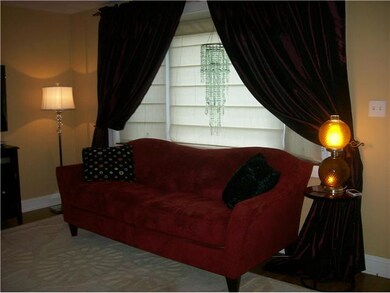 Living Room Living rm has bay window with custom b