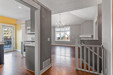 Step inside to this spacious foyer that opens to the main floor living space and kitchen.