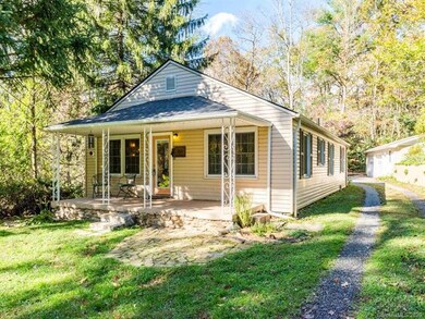 Front view of home with covered front porch & 2018