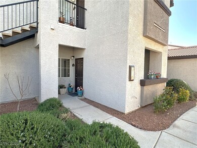 View of side of property featuring stucco siding