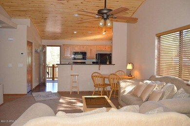 Open living area with recessed lights