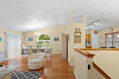 Main level, open concept with cathedral ceilings.