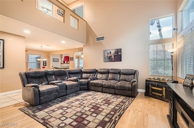 Living area featuring light wood-type flooring, a