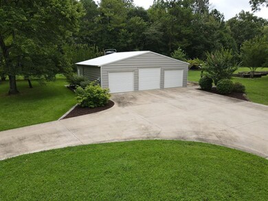 3 bay garage with workshop!
