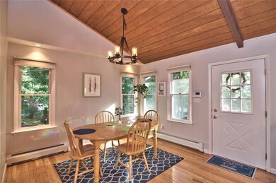 Step inside to the dining area w/ true hardwood fl