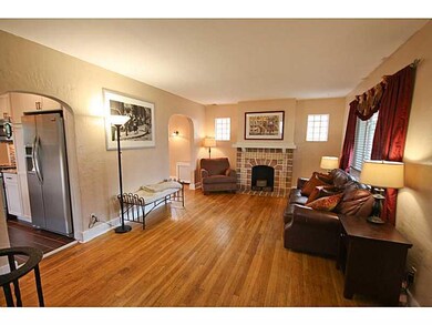 Living Room. The living room features hardwood flo