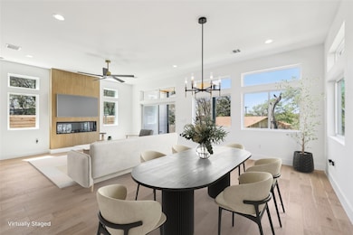 Dining room featuring visible vents, plenty of na
