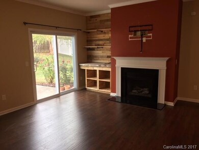 modern built-in area. Family room is wired for surround. TV area in process of repair and repaint.