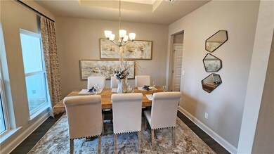 Dining area featuring dark hardwood / wood-style f