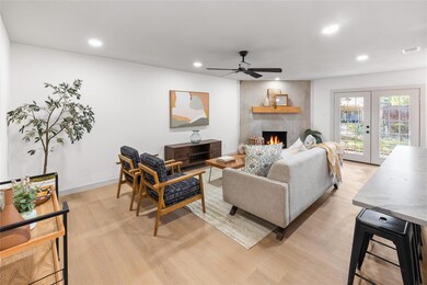 Living room featuring light hardwood / wood-style 