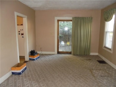 Apt 1-Dining Room with siding glass doors to a pri