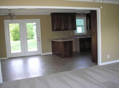 Living Room into Kitchen/Eat-in Area