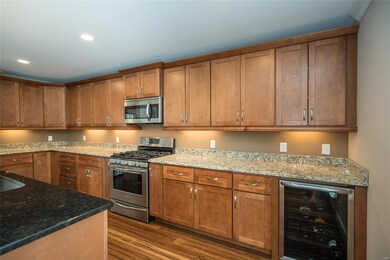 Custom cabinetry in kitchen with stainless appliances
