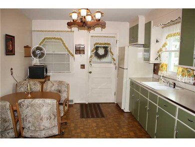 Kitchen. Another view of the kitchen with door lea