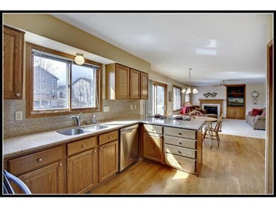 Updated kitchen with hardwood floors, Silestone co