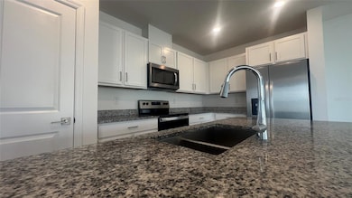 692 Stoney Pointe Cir, Kissimmee, FL 34747 - photo 4