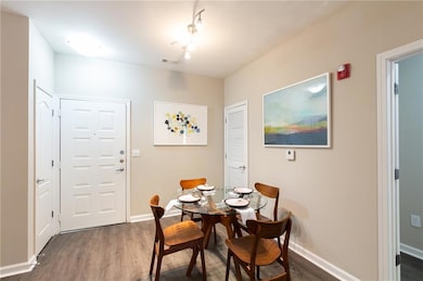 Dining area featuring dark hardwood / wood-style f