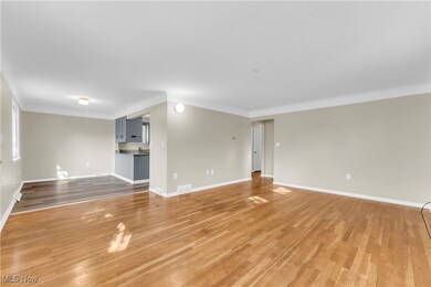 Unfurnished living room with wood-type flooring