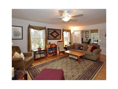 Living Room. Large sun-filled room with custom bui
