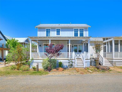View of front of property featuring metal roof, a 