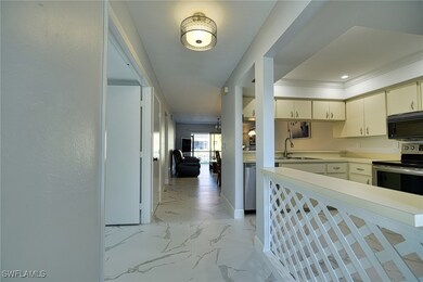 Kitchen with appliances with stainless steel finis