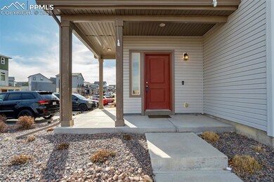 Wrap around covered porch with guest parking close