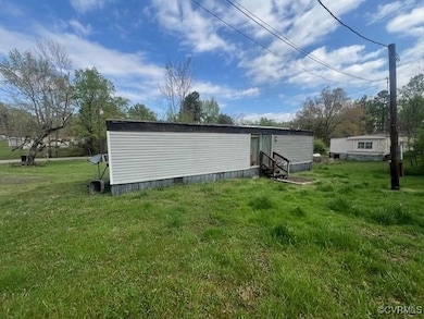 View of outdoor structure with entry steps