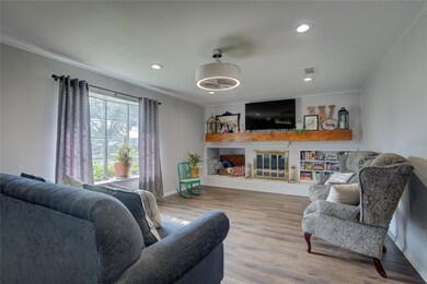 Living room featuring hardwood / wood-style floori