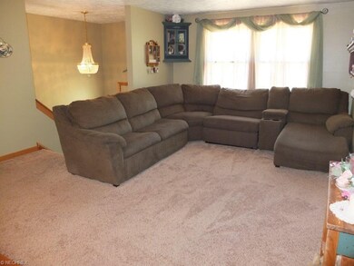 Living room is open to the kitchen.