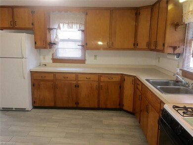 The kitchen has ample cabinetry and counter space.