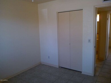 Newer neutral ceramic tile throughout.