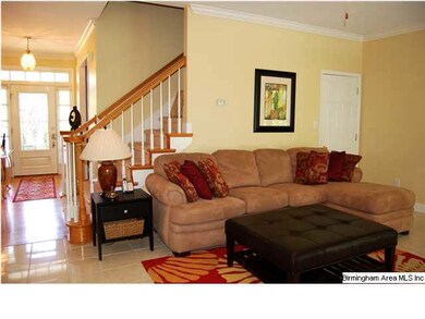 Crown molding, plenty of wood trim, ceiling fan & 