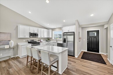 Kitchen - photo is of a previous inventory home. Inquire for more details and options.