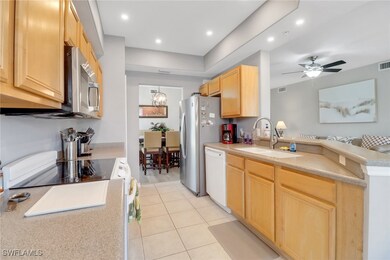 Kitchen featuring stainless steel appliances, ligh