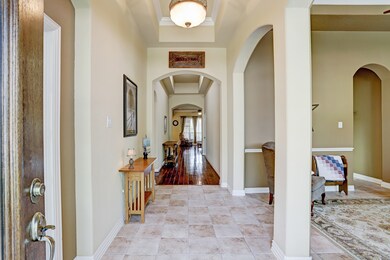 As you enter the home, there is a Study with Frenc