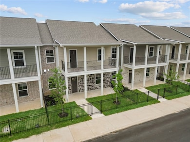 View of property featuring a fenced front yard