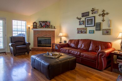 The wood burning fireplace is currently fitted wit