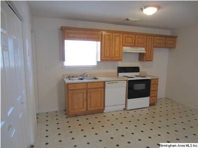 ...and cozy kitchen that has a dishwasher!...