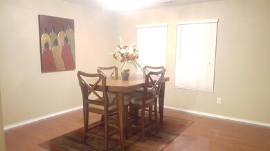 Enter into this lovely formal dining room setting.