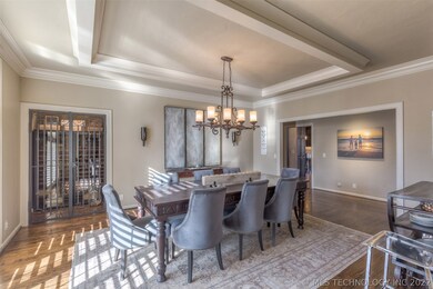 Large Formal Dining Room Highlighted by a Wine Vau