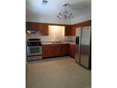 Large eat in kitchen with new vinyl and stainless 