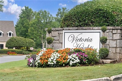 Community sign featuring a yard