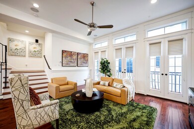Second floor living space, with floor to ceiling w