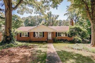 Welcome to this charming brick ranch home with a b