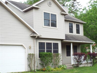 Front - with Attached 2 Stall Garage & Covered Fro