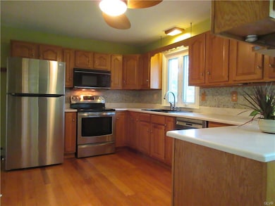 Updated kitchen with stainless steel appliances, c