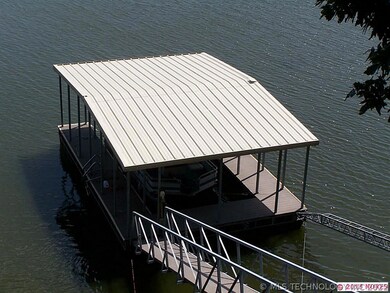 Nice boat dock sits in fairly deep water, 25 ft  M