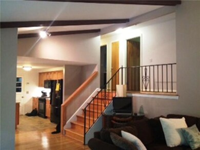 Living Room. Living room looking into kitchen.